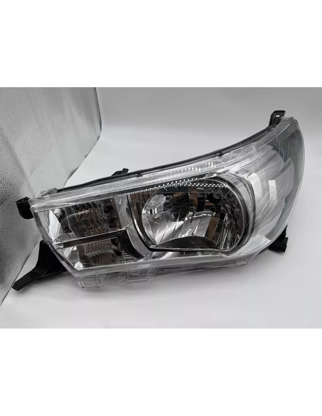 Optique avant gauche réglage manuel halogène Toyota Hilux Revo