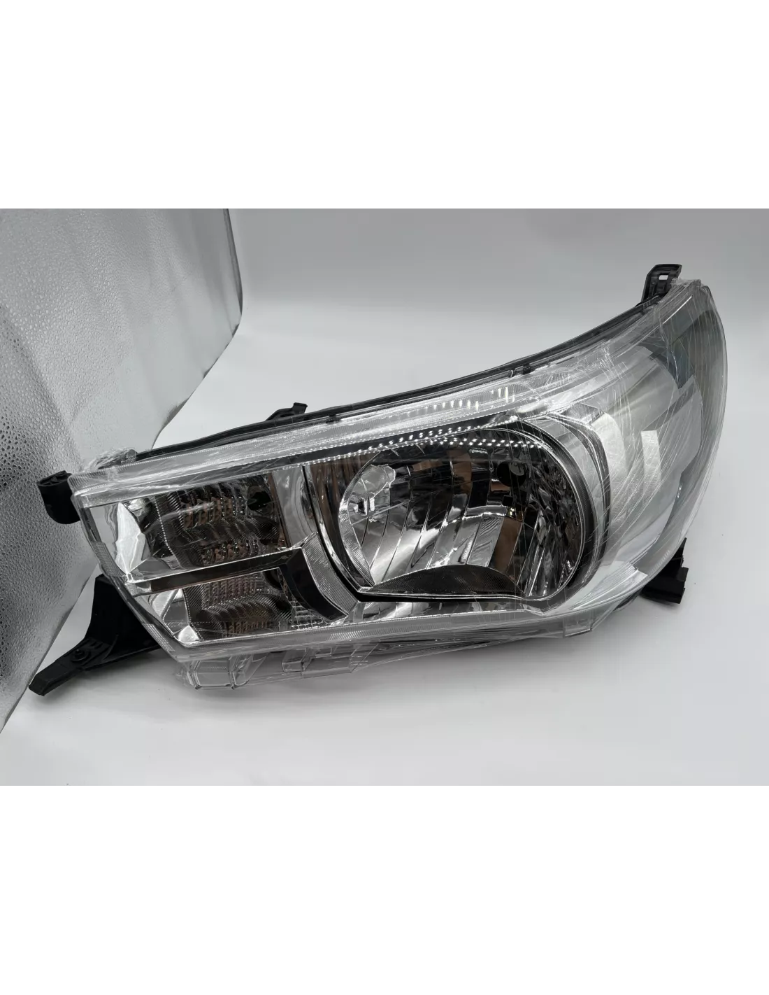 Optique avant gauche réglage manuel halogène Toyota Hilux Revo