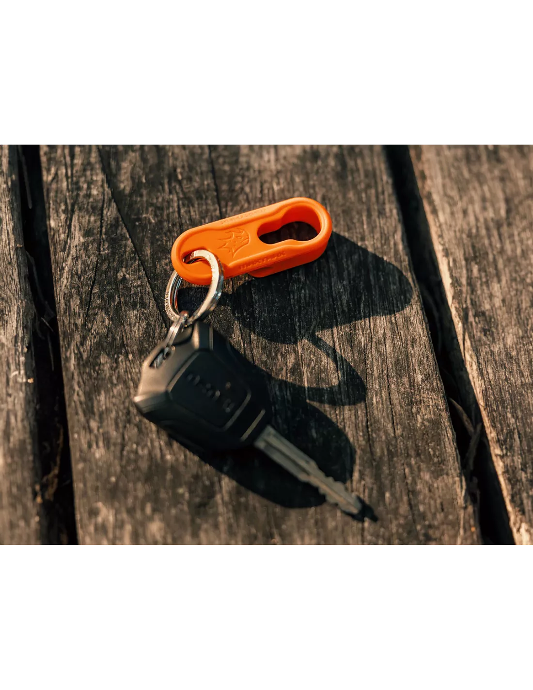 Aanhalen sleutelhanger en losmaken oranje maxtrax pins