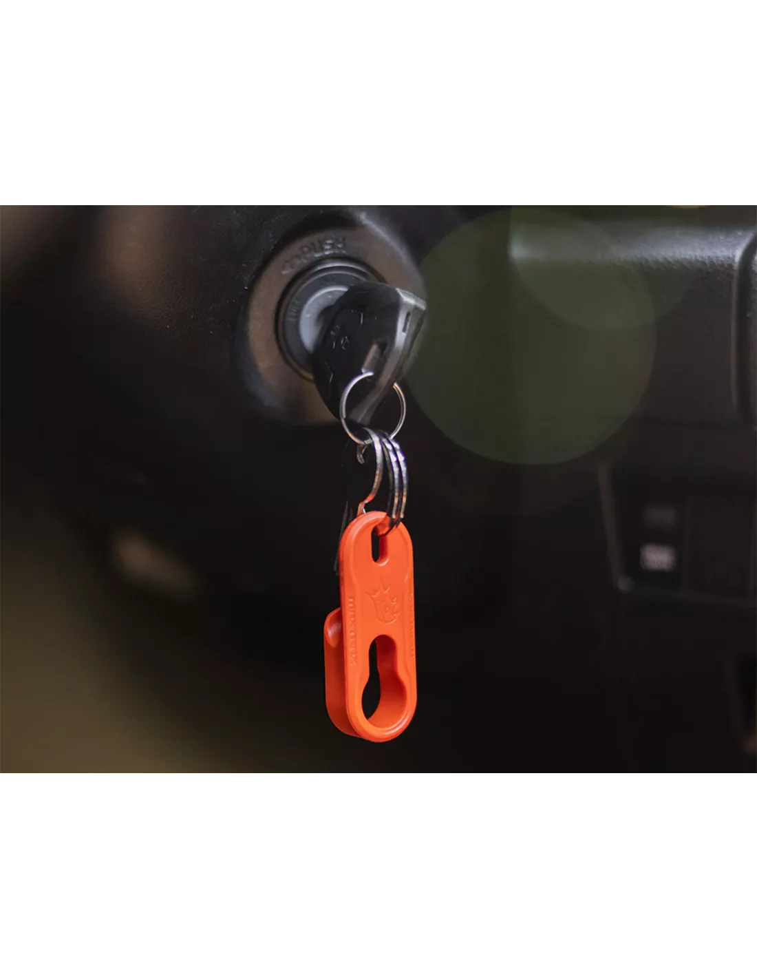 Aanhalen sleutelhanger en losmaken oranje maxtrax pins
